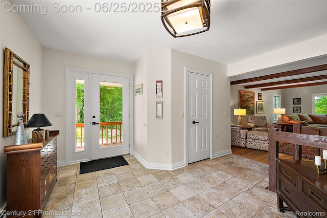7340 Deer Lake Rd, Clarkston, MI 48346 - entrance foyer featuring baseboards and beam ceiling