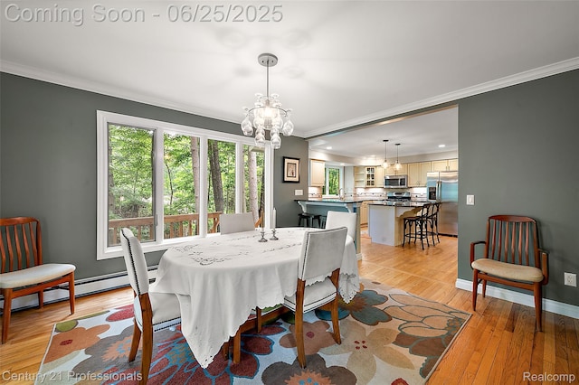 7340 Deer Lake Rd, Clarkston, MI 48346 - dining space featuring crown molding, a chandelier, light wood finished floors, a baseboard heating unit, and recessed lighting