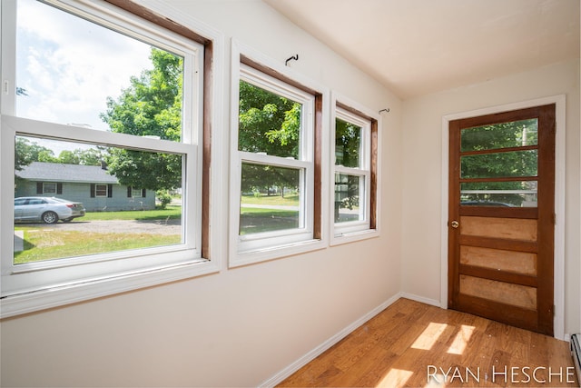 160 Division St, Saranac, MI 48881 - entryway featuring light wood finished floors and baseboards