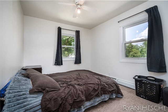 160 Division St, Saranac, MI 48881 - carpeted bedroom featuring ceiling fan and baseboard heating