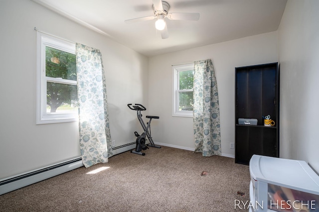 160 Division St, Saranac, MI 48881 - workout area featuring carpet, a ceiling fan, and baseboard heating