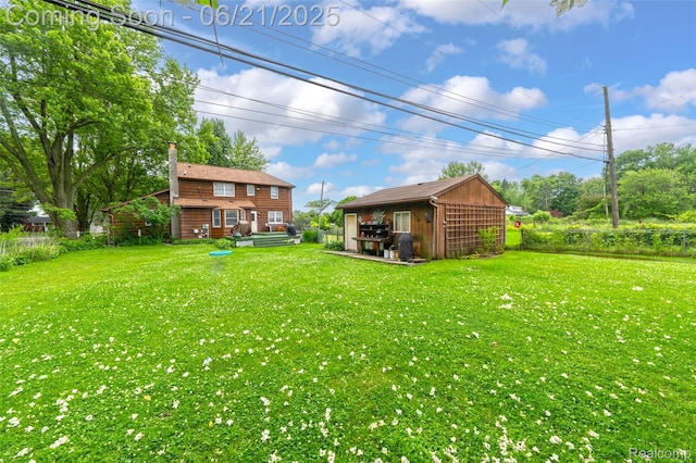 47645 Sugarbush Rd, Chesterfield, MI 48047 - view of yard with an outbuilding