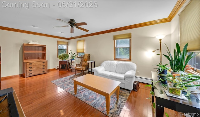 47645 Sugarbush Rd, Chesterfield, MI 48047 - living room featuring a baseboard heating unit, a ceiling fan, wood finished floors, crown molding, and baseboard heating
