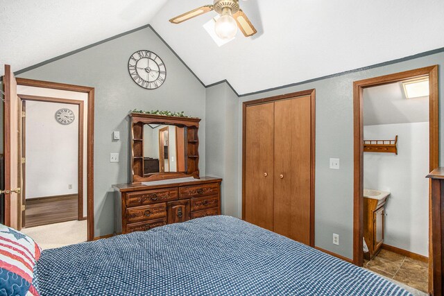 8150 B Dr N, Battle Creek, MI 49014 - bedroom with lofted ceiling, a closet, a ceiling fan, and ensuite bathroom