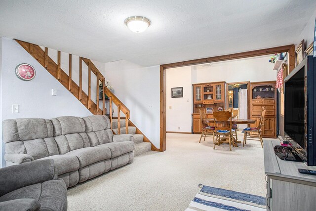 8150 B Dr N, Battle Creek, MI 49014 - living area featuring stairs and carpet flooring