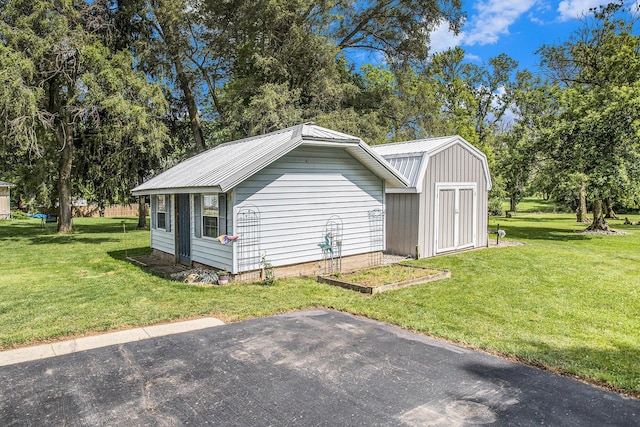 8150 B Dr N, Battle Creek, MI 49014 - view of shed with view of scattered trees