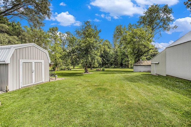8150 B Dr N, Battle Creek, MI 49014 - view of green lawn with a storage unit