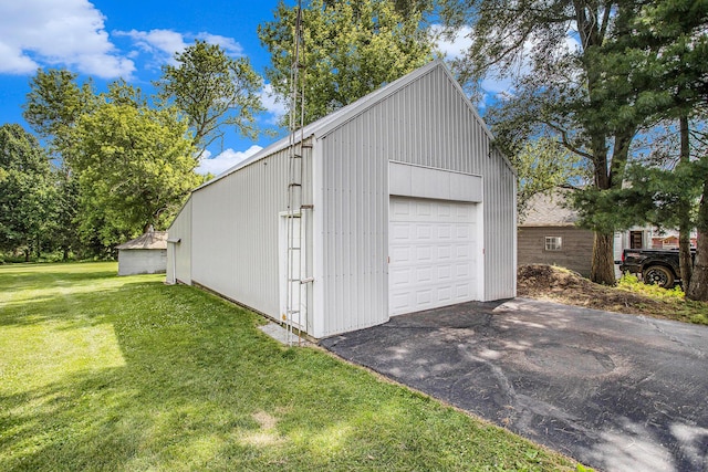 8150 B Dr N, Battle Creek, MI 49014 - detached garage with asphalt driveway