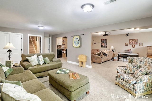 1728 N Brandon Ridge Dr NW, Walker, MI 49544 - living area with light carpet and stairs