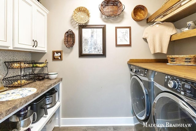 1728 N Brandon Ridge Dr NW, Walker, MI 49544 - laundry room with washer and clothes dryer and cabinet space