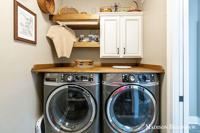 1728 N Brandon Ridge Dr NW, Walker, MI 49544 - laundry room featuring independent washer and dryer and cabinet space