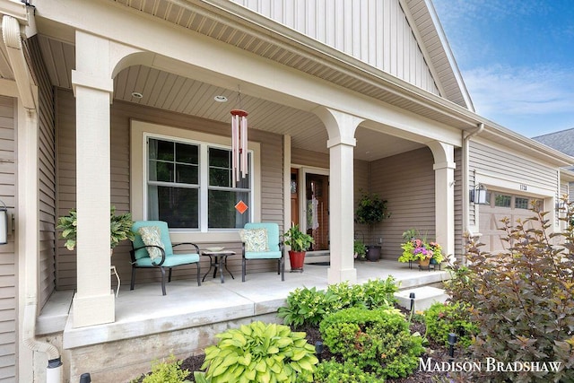 1728 N Brandon Ridge Dr NW, Walker, MI 49544 - doorway to property featuring covered porch and board and batten siding