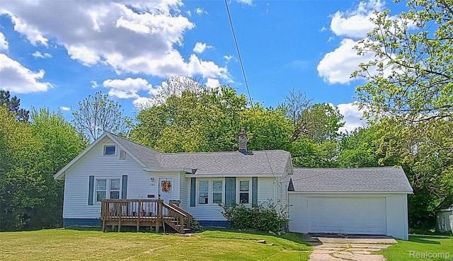 1460 S Dye Rd, Flint, MI 48532 - view of front facade featuring a front lawn, driveway, a garage, and a chimney