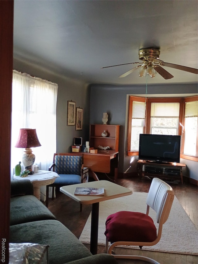 1460 S Dye Rd, Flint, MI 48532 - living area featuring ceiling fan and wood finished floors