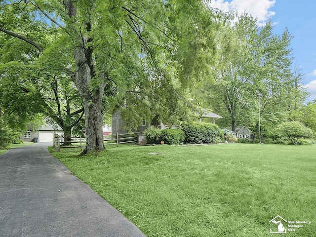 2252 W Temperance Rd, Temperance, MI 48182 - view of yard with a garage