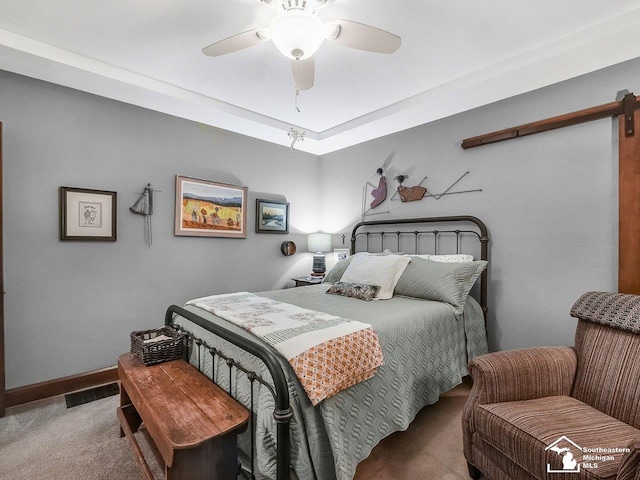 2252 W Temperance Rd, Temperance, MI 48182 - bedroom featuring carpet floors, ceiling fan, and a barn door