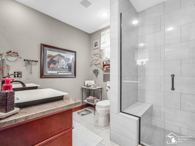 2252 W Temperance Rd, Temperance, MI 48182 - bathroom with a stall shower, vanity, and tile patterned floors