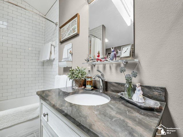 2252 W Temperance Rd, Temperance, MI 48182 - bathroom featuring vanity, shower / bath combination with curtain, and a textured wall