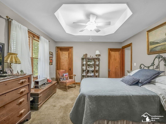 2252 W Temperance Rd, Temperance, MI 48182 - bedroom with a raised ceiling, light carpet, ceiling fan, and a skylight