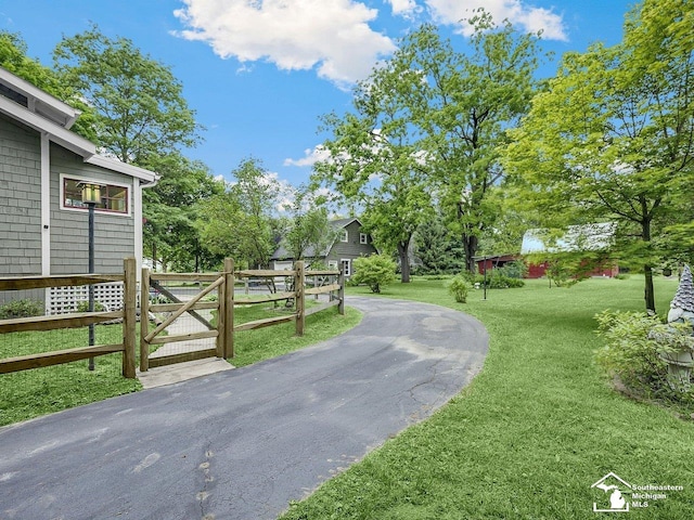 2252 W Temperance Rd, Temperance, MI 48182 - view of asphalt driveway featuring a gate