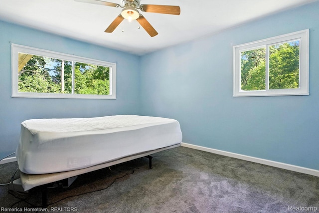 42424 Bradner Ct, Plymouth, MI 48170 - carpeted bedroom with baseboards and a ceiling fan