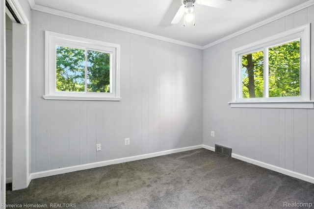 42424 Bradner Ct, Plymouth, MI 48170 - unfurnished room featuring healthy amount of natural light, dark carpet, a ceiling fan, and crown molding