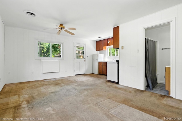 42424 Bradner Ct, Plymouth, MI 48170 - unfurnished living room featuring a ceiling fan and light carpet