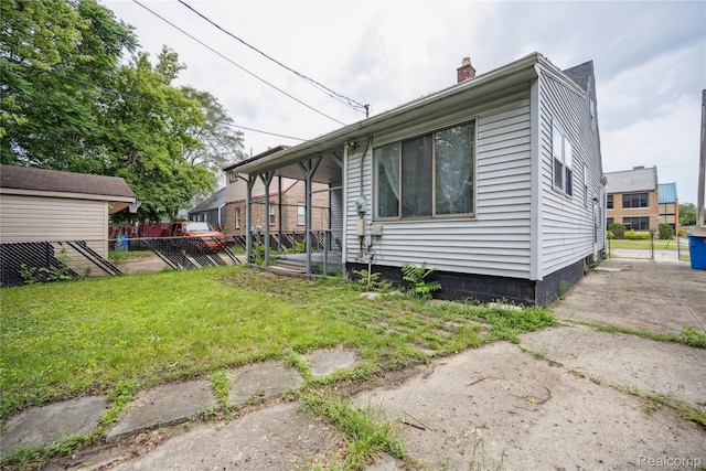 25895 Annapolis St, Dearborn Heights, MI 48125 - view of side of property featuring a chimney