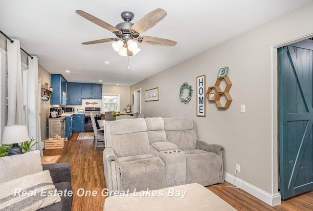 4185 Shattuck Rd, Saginaw, MI 48603 - living area with a ceiling fan, dark wood-style flooring, and recessed lighting