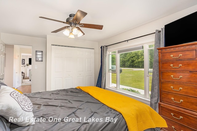 4185 Shattuck Rd, Saginaw, MI 48603 - bedroom with a closet and a ceiling fan
