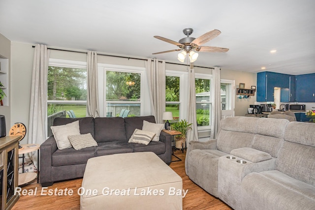 4185 Shattuck Rd, Saginaw, MI 48603 - living area featuring healthy amount of natural light, ceiling fan, light wood-style floors, and recessed lighting