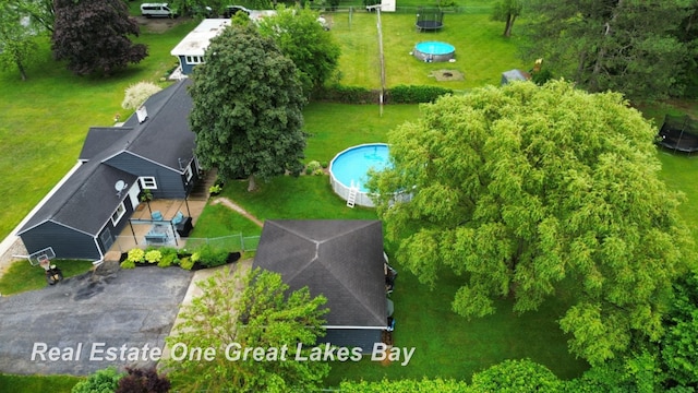 4185 Shattuck Rd, Saginaw, MI 48603 - aerial view of property and surrounding area with a pool area