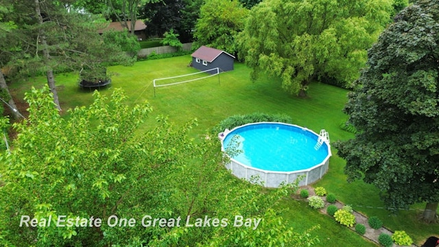4185 Shattuck Rd, Saginaw, MI 48603 - view from above of property featuring a pool