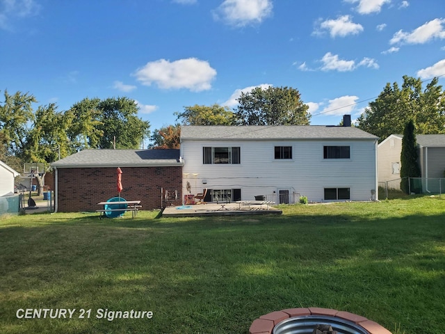 11424 Hazel Ave, Grand Blanc, MI 48439 - rear view of house with a chimney