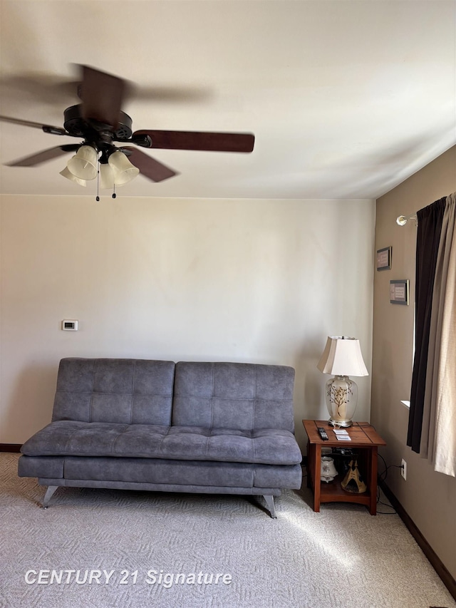 11424 Hazel Ave, Grand Blanc, MI 48439 - carpeted living room featuring a ceiling fan and baseboards