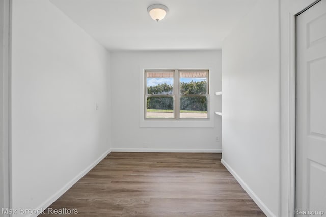 165 W Colgate Ave, Pontiac, MI 48340 - empty room with wood finished floors and baseboards
