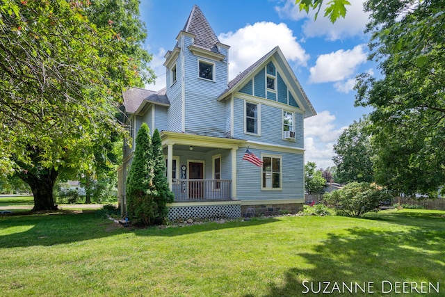 409 W Bridge St, Lyons, MI 48851 - victorian house featuring covered porch and a front yard