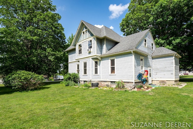 409 W Bridge St, Lyons, MI 48851 - view of side of property featuring a yard and a shingled roof