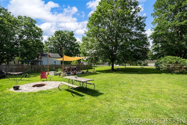 409 W Bridge St, Lyons, MI 48851 - view of yard featuring a fire pit