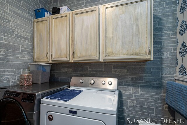 409 W Bridge St, Lyons, MI 48851 - laundry room with separate washer and dryer and cabinet space