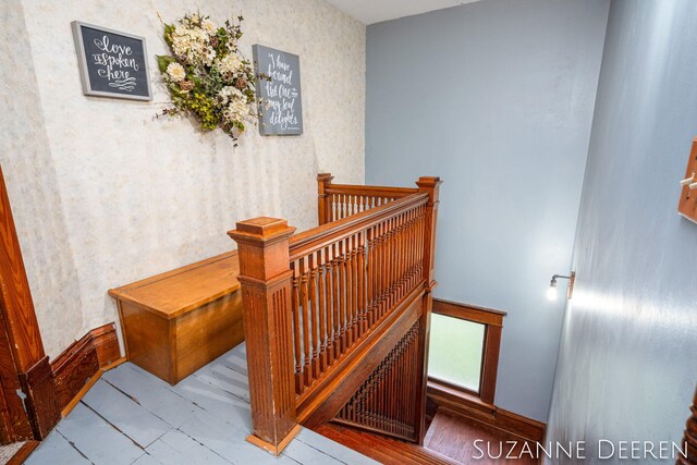 409 W Bridge St, Lyons, MI 48851 - stairs with wallpapered walls and baseboards