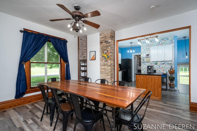 409 W Bridge St, Lyons, MI 48851 - dining space with wood finished floors and ceiling fan