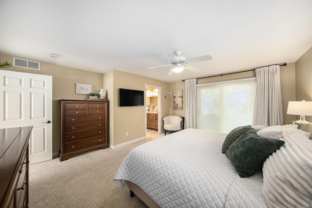 117 High View Ct, Brooklyn, MI 49230 - bedroom featuring light colored carpet, a ceiling fan, and ensuite bathroom
