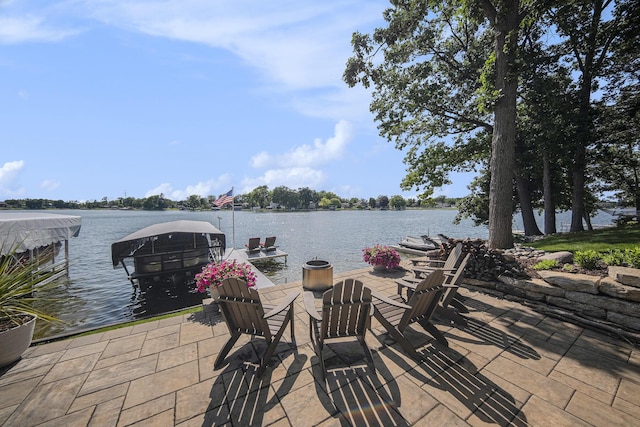 117 High View Ct, Brooklyn, MI 49230 - view of patio featuring a water view and a boat dock