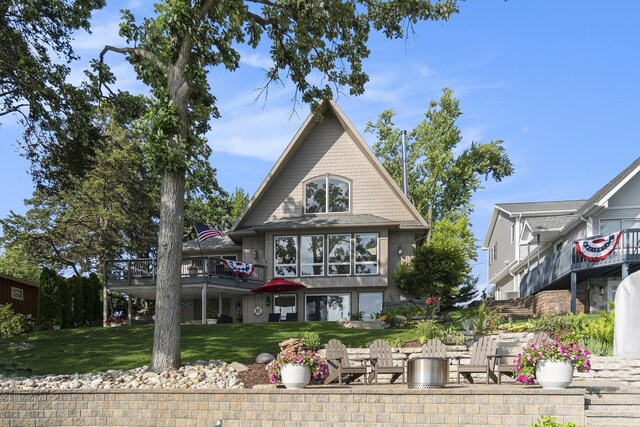 117 High View Ct, Brooklyn, MI 49230 - rear view of house with a yard and a deck