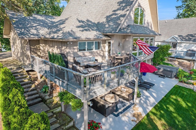117 High View Ct, Brooklyn, MI 49230 - rear view of house featuring a patio, a wooden deck, roof with shingles, and an outdoor living space