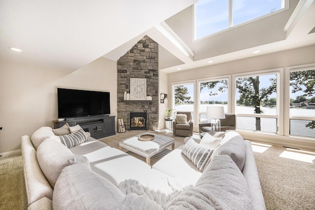 117 High View Ct, Brooklyn, MI 49230 - living area featuring carpet flooring, a high ceiling, a stone fireplace, and recessed lighting