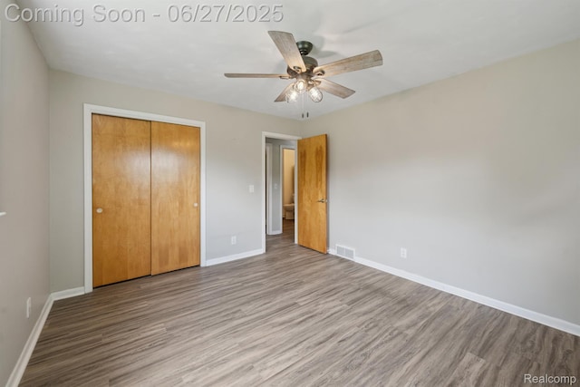 15501 Turner, Lansing, MI 48906 - unfurnished bedroom with wood finished floors, a closet, and ceiling fan