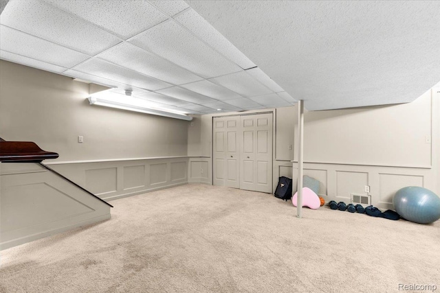 18068 Autumn Ln, Macomb, MI 48044 - finished basement featuring a decorative wall, carpet flooring, and a wainscoted wall