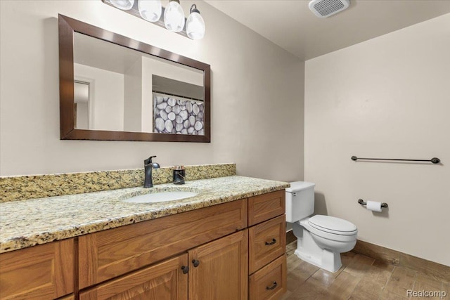 18068 Autumn Ln, Macomb, MI 48044 - full bath featuring vanity and wood finished floors